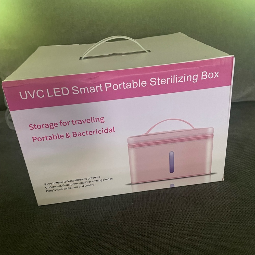 UVC LED smart portable sterilizing box. New in box. Available in pink or blue.